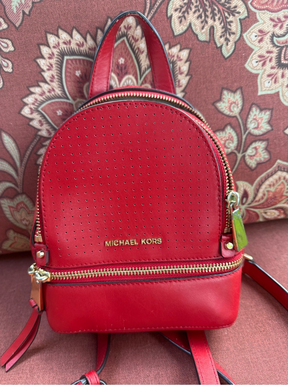 MICHAEL KORS Red Perforated Mini Backpack with Gold Hardware